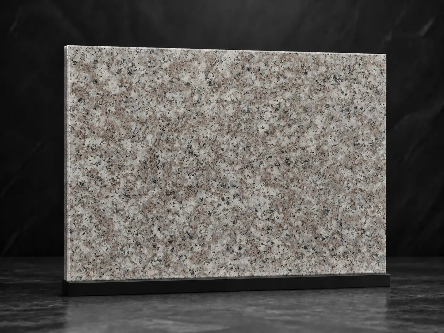 Vzorek světlé přírodní žuly Misty Brown s jemným šedým, béžovým a růžovým zrněním – STONE PARTNERS